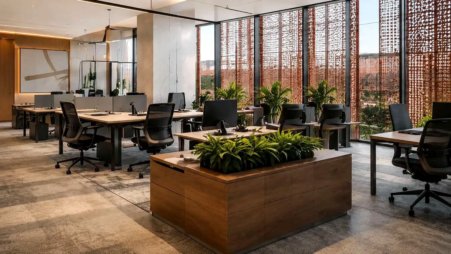 Office interior behind the perforated copper screen at RIFTARA Al Aqeeq