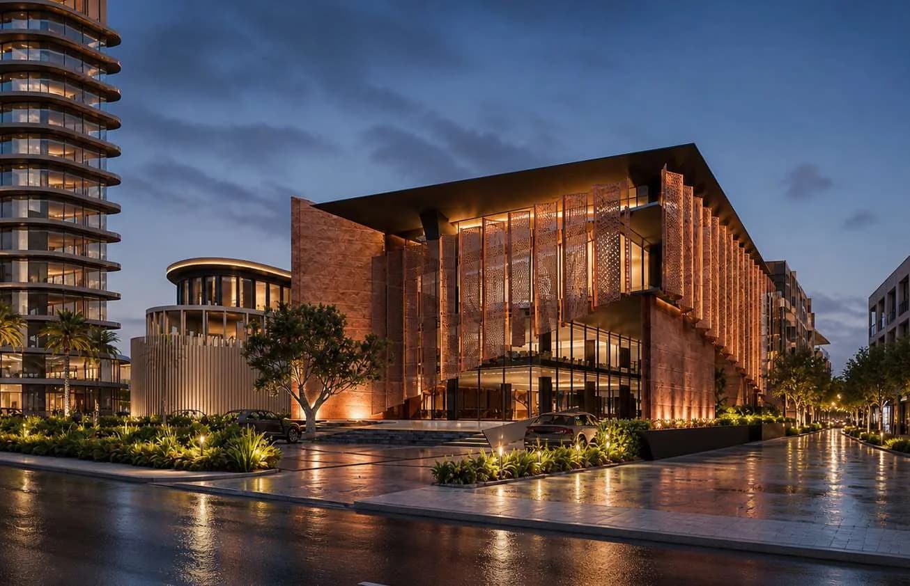 Night view of the copper-screened RIFTARA Al Aqeeq façade in Riyadh